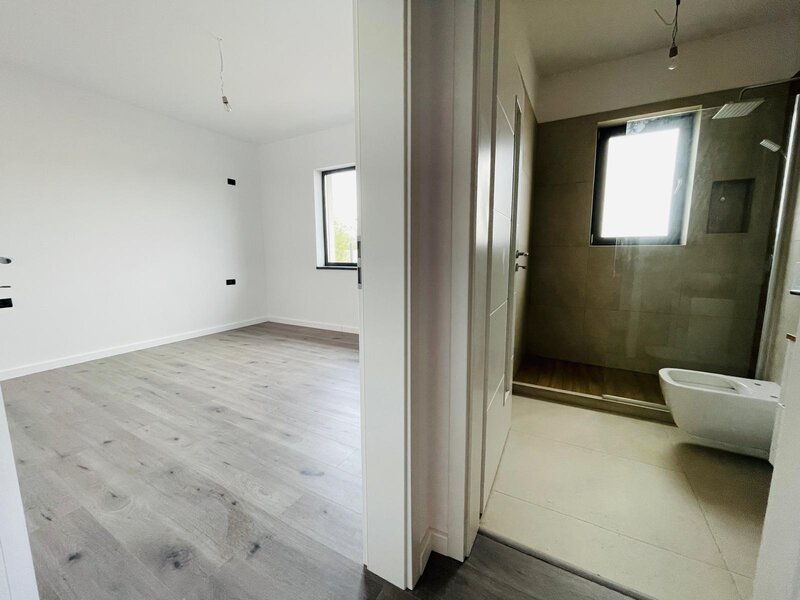 Domnesti casa de vanzare langa padure 3 dormitore +2 bai